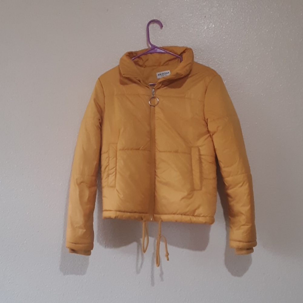 A cute small yellow jacket